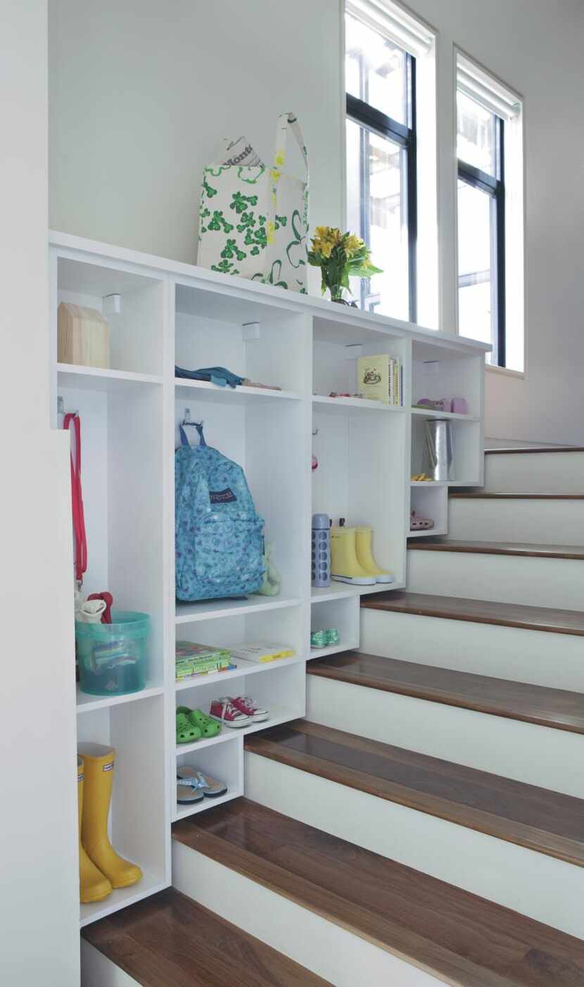 
Get all the stuff out of the hall and off the floor neatly into cubbies. 
