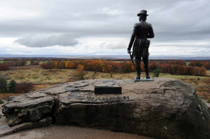 The Gen. Gouverneur K. Warren statue overlooks the Gettysburg battlefield from peak of...