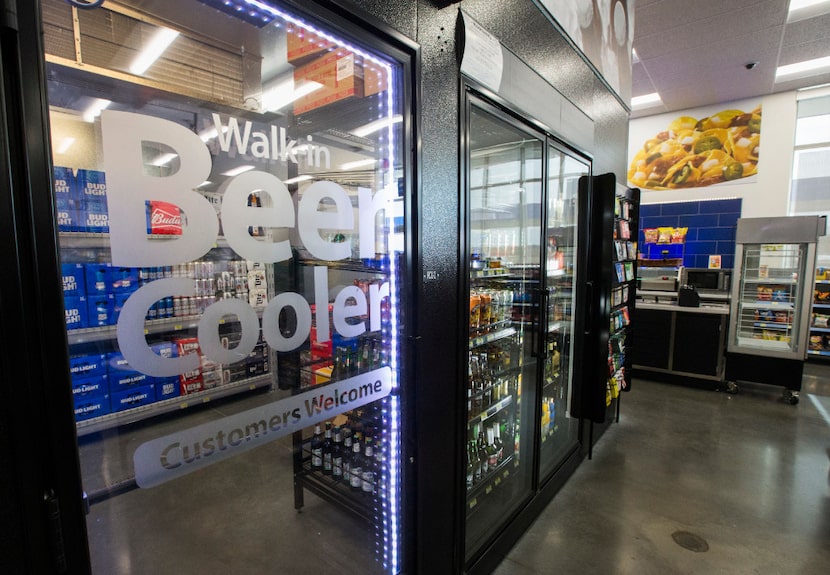 A walk-in beer cooler inside a new Walmart convenience store on Wednesday, February 8, 2017...