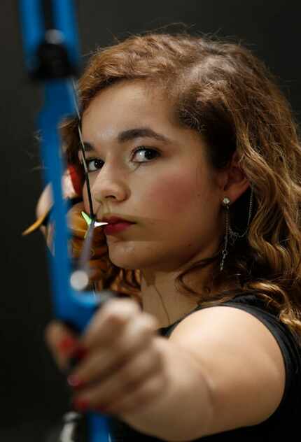 Allen's Dorothy Cobb poses for a portrait at Texas Archery Academy in Plano on Thursday,...