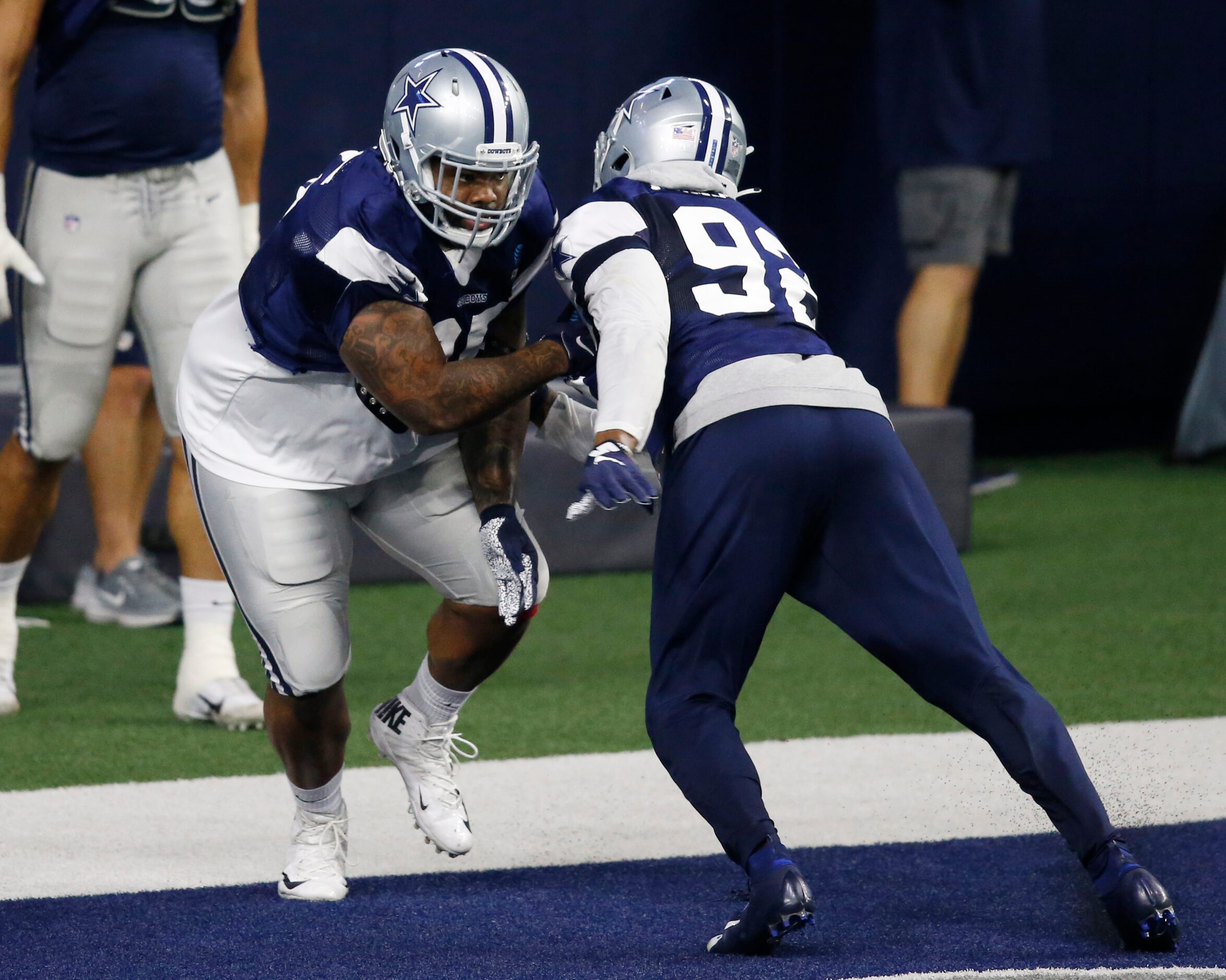 Dallas Cowboys defensive tackle Dontari Poe (95) runs through a drill with Dallas Cowboys...