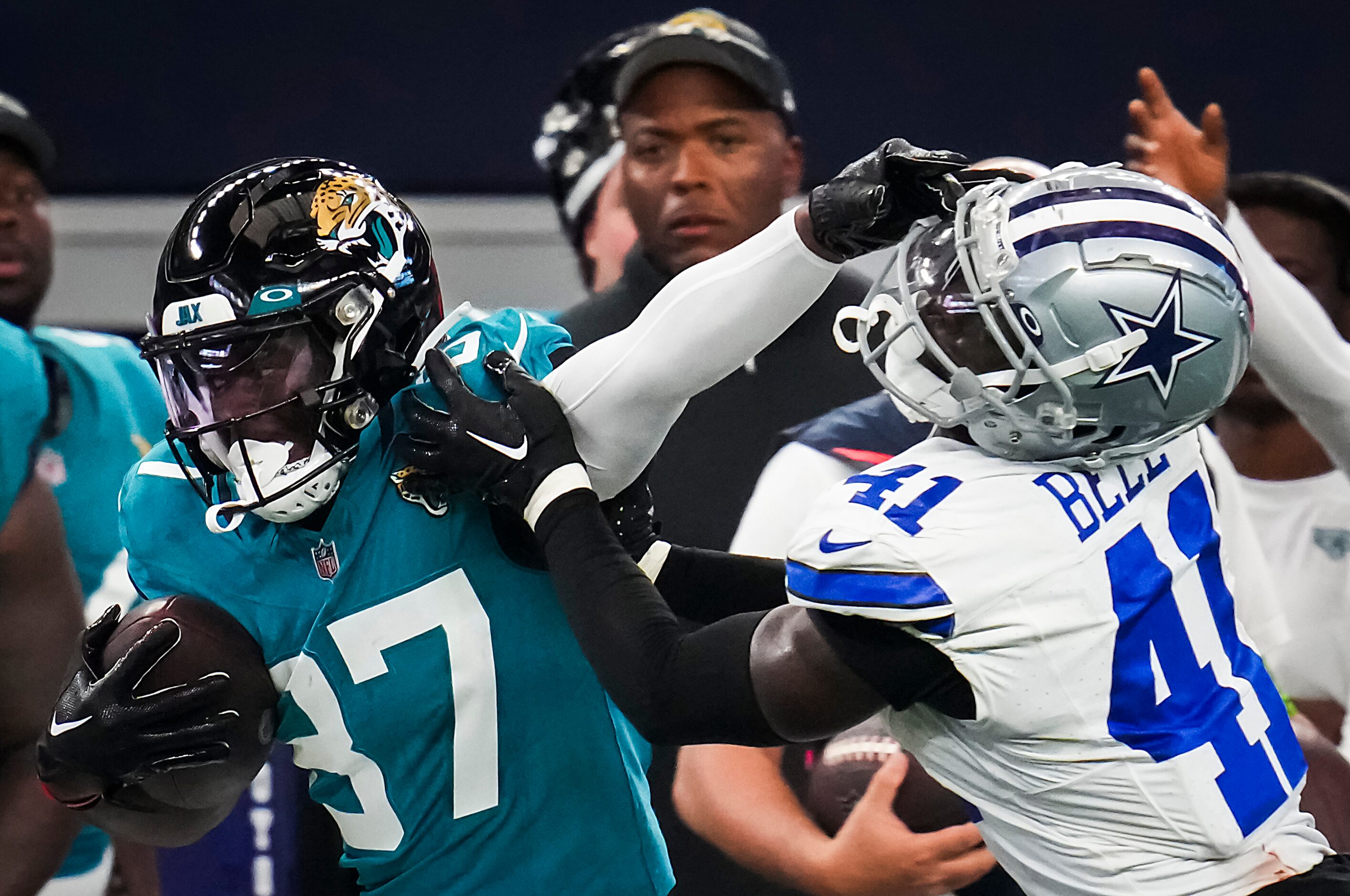 Jacksonville Jaguars cornerback Tre Herndon (37) pushes past Dallas Cowboys defensive back...