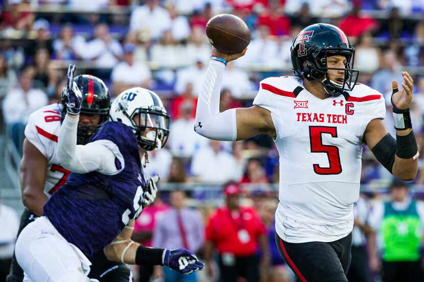 Texas Tech quarterback Patrick Mahomes II (5) throws a pass during the second half of an...