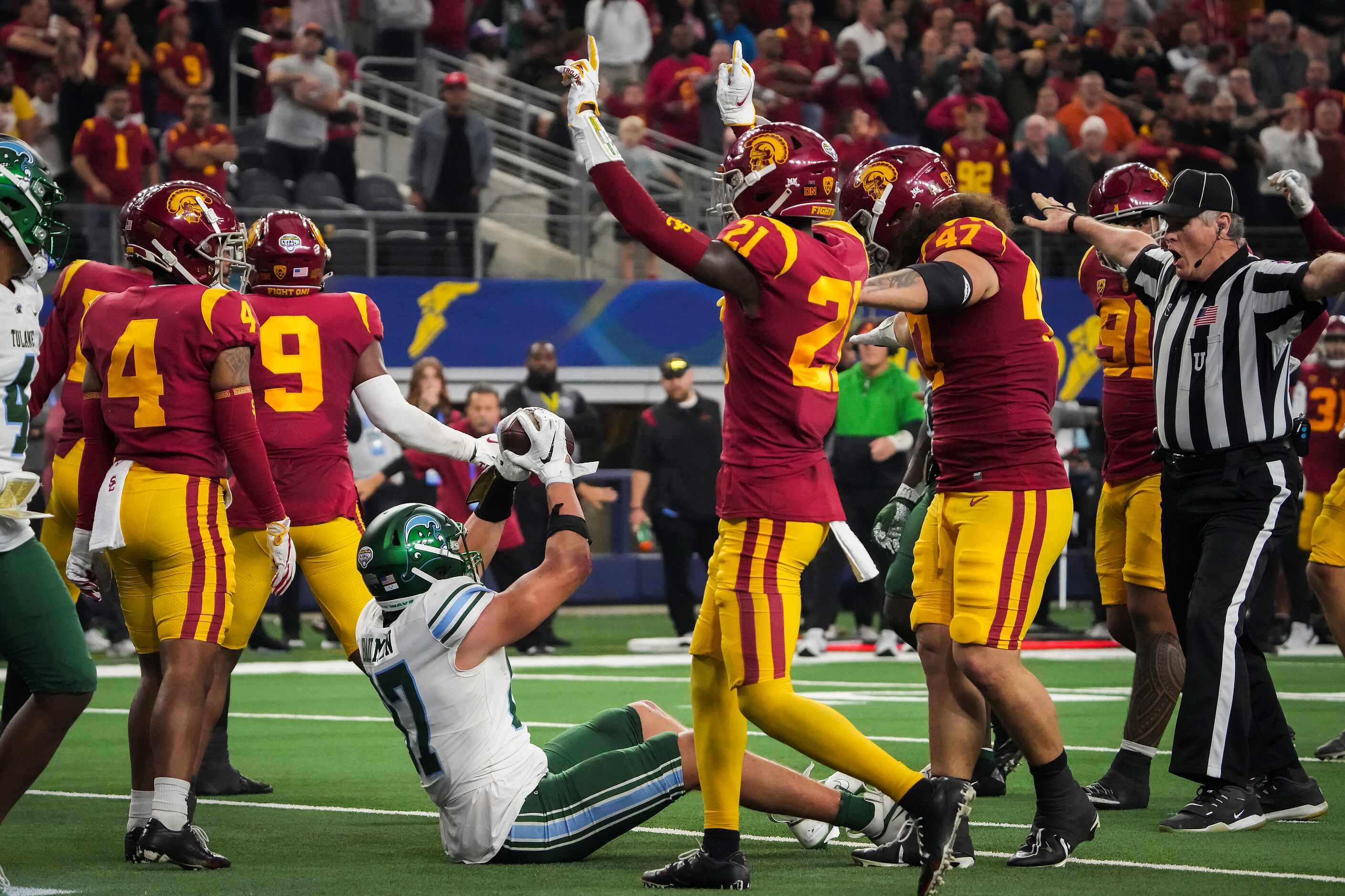 Tulane tight end Alex Bauman (87) signals for a touchdown as the officials signal no-catch...