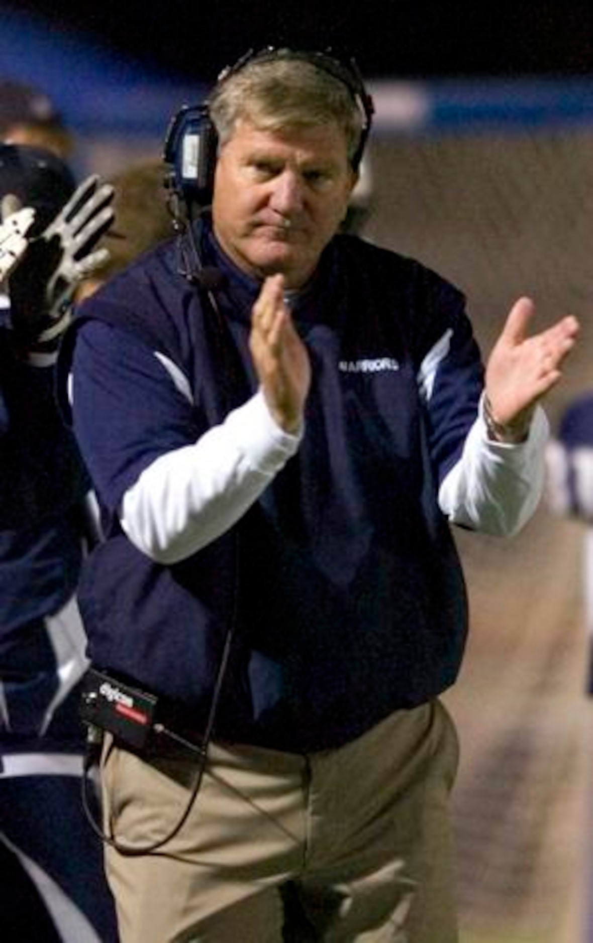 Argyle Liberty Christian coach Mark Bowles reacts to his team scoring a touchdown in a 28-14...