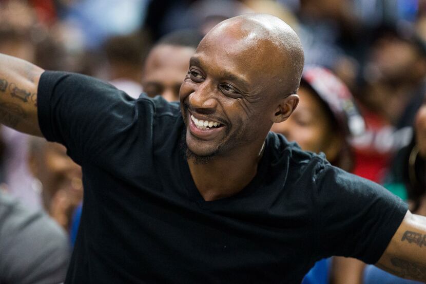Former Dallas Mavericks player Jason "Jet" Terry smiles from his seat during a Big 3 playoff...