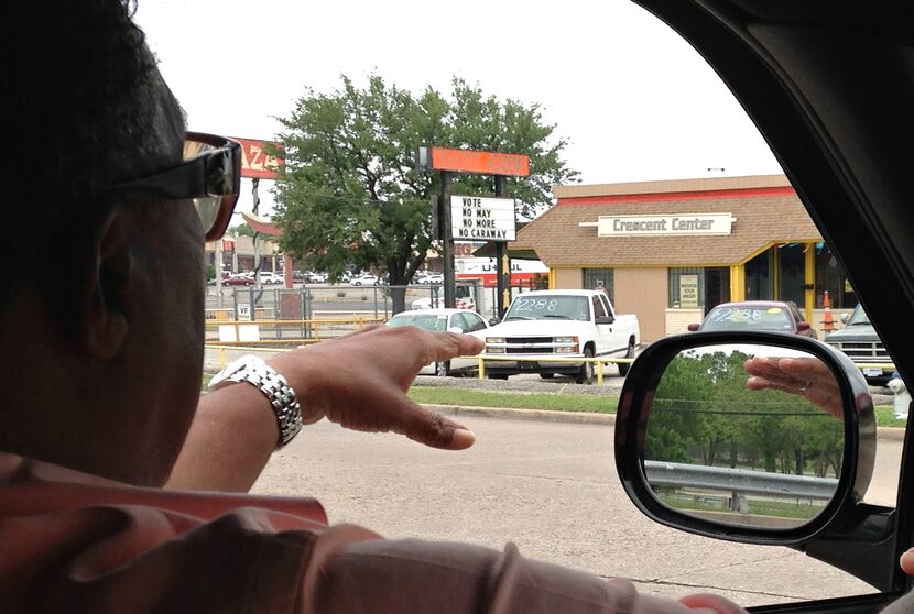 Caraway points out the anti-Caraway sign posted in his district, near Big T Plaza.