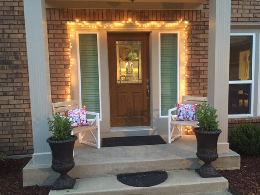 Author Amina Hassan decorates her home with Christmas lights for the Muslim holiday Eid.