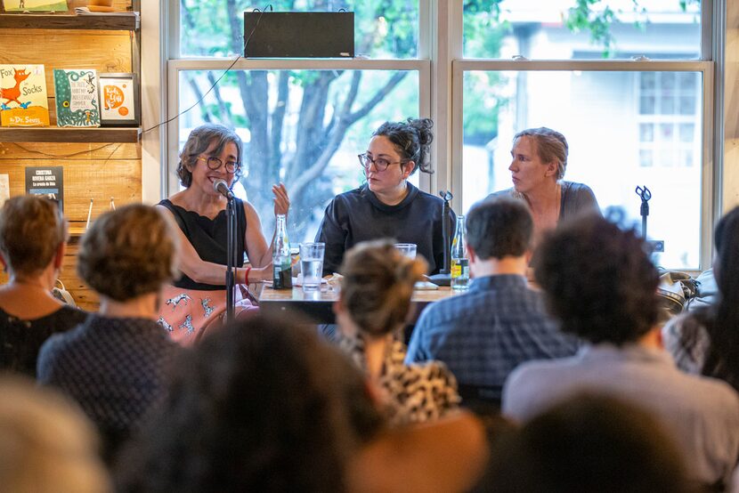 Attendees listen as authors Cristina Rivera Garza (left), Leni Zumas (center) and Miriam...