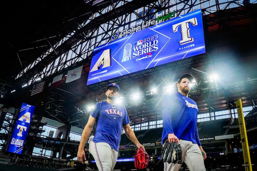 Texas Rangers starting pitchers Nathan Eovaldi (left) and Jordan Montgomery walked from the...