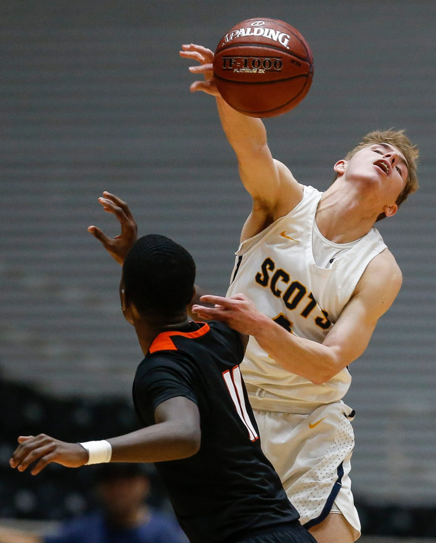 Highland Park's Jack Pease (4) fires off a pass over Lancaster's Jalen Williams (11) during...