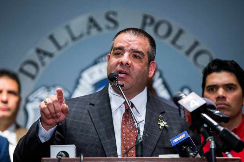 Dallas Police Sergeant Mike Mata, president of the Dallas Police Association, announces to...