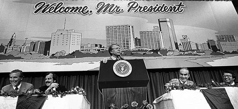  President Jimmy Carter addresses luncheon attendees as Sen. Lloyd Bentsen (from left), Fort...