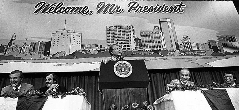  President Jimmy Carter addresses luncheon attendees as Sen. Lloyd Bentsen (from left), Fort...