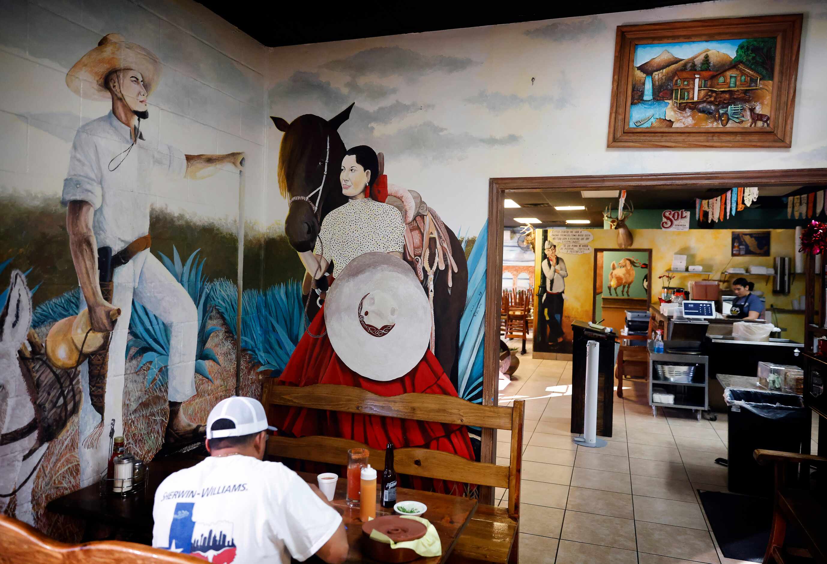 Fort Worth artist Elio Martinez from Oaxaca, México has painted several Mexican scene and...