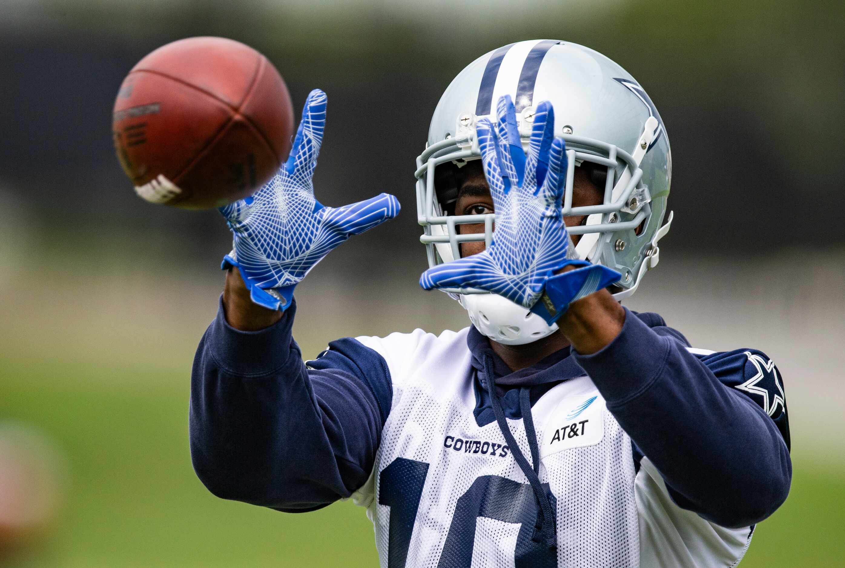 Dallas Cowboys wide receiver Amari Cooper (19) catches a pass during practice at The Star in...