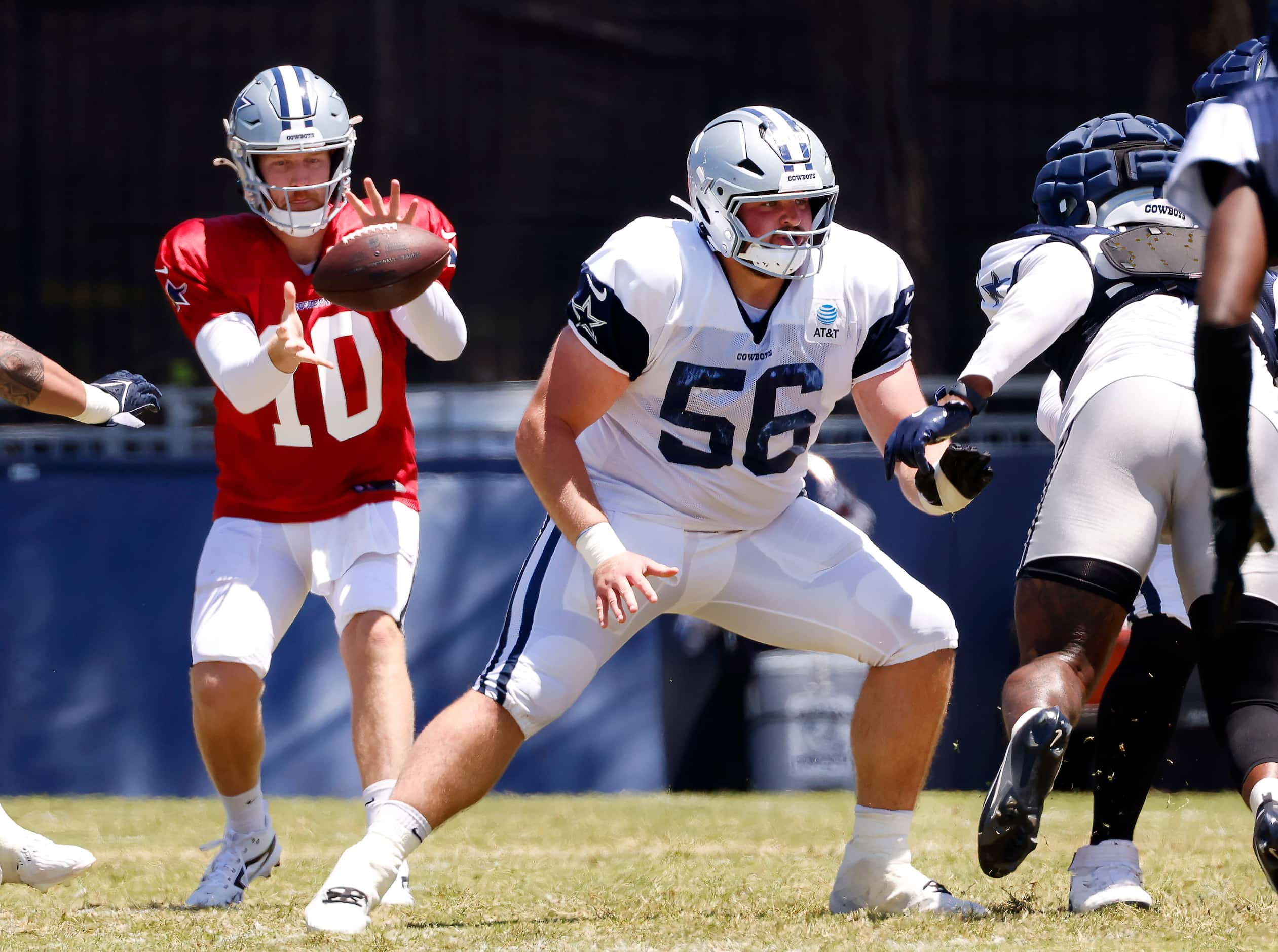 Dallas Cowboys center Cooper Beebe (56) blocks after snapping the ball to quarterback Cooper...