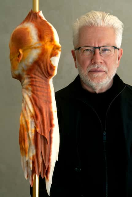 Artist Barry X Ball, photographed with a piece that includes a self-portrait, in Mexican...