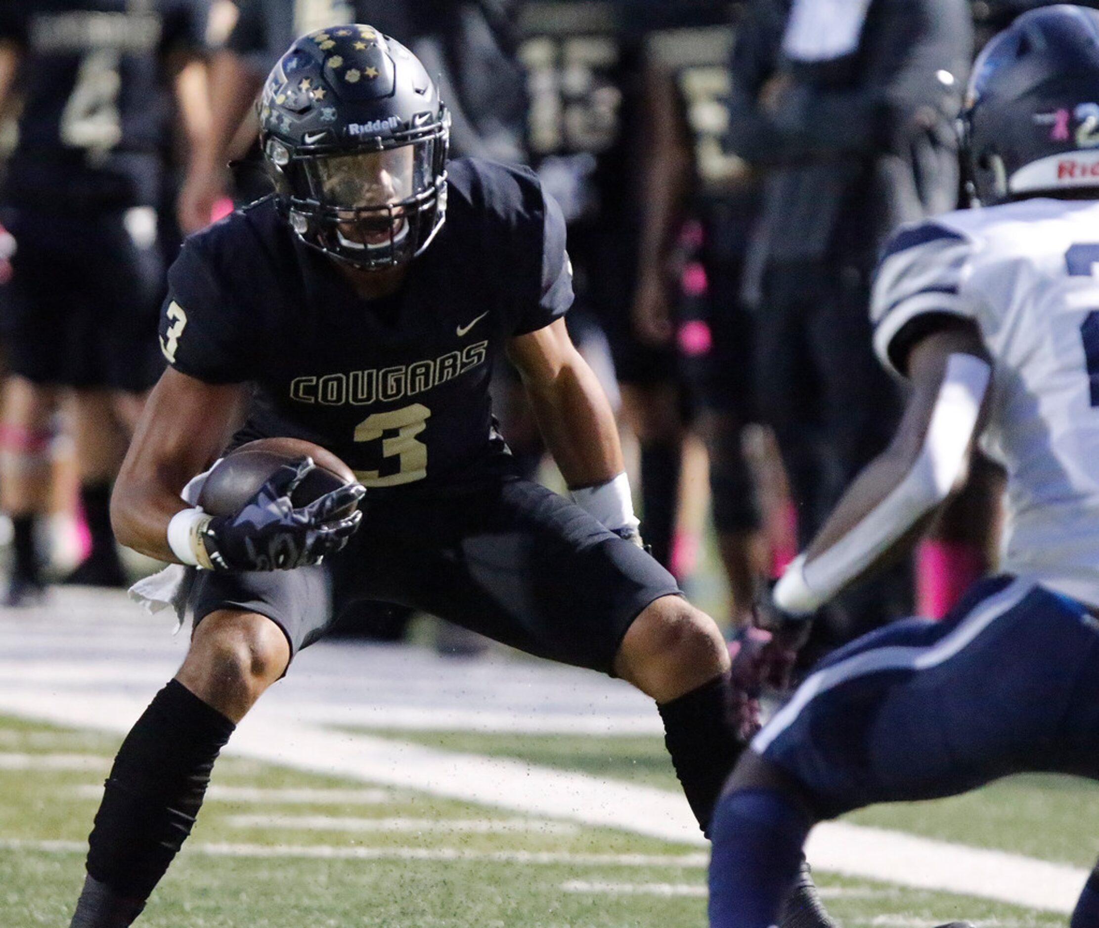 The Colony High School wide receiver Christian Gonzalez (3) tries to gets yardage after the...