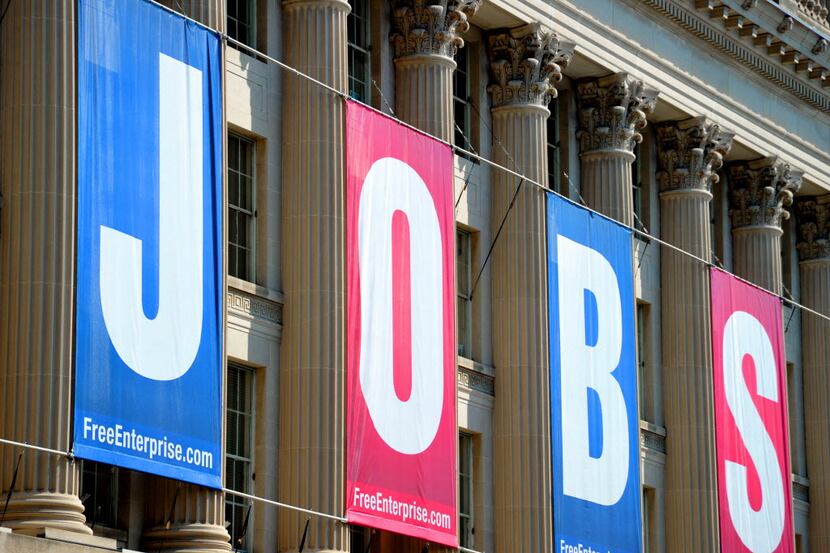 (FILES) A jobs sign is seen on the front of the US Chamber of Commerce building in this...