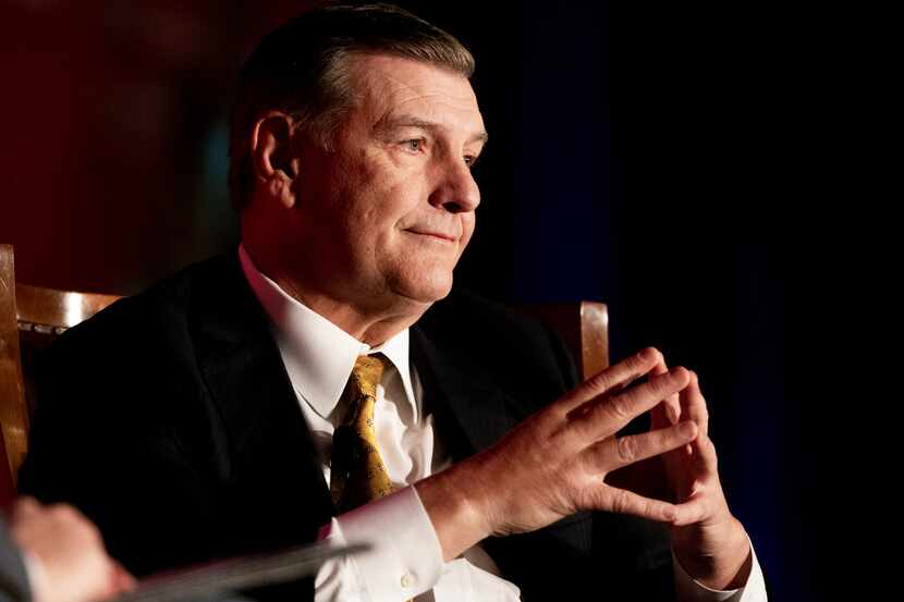 Dallas Mayor Mike Rawlings gets emotional before talking about his wife on stage during...