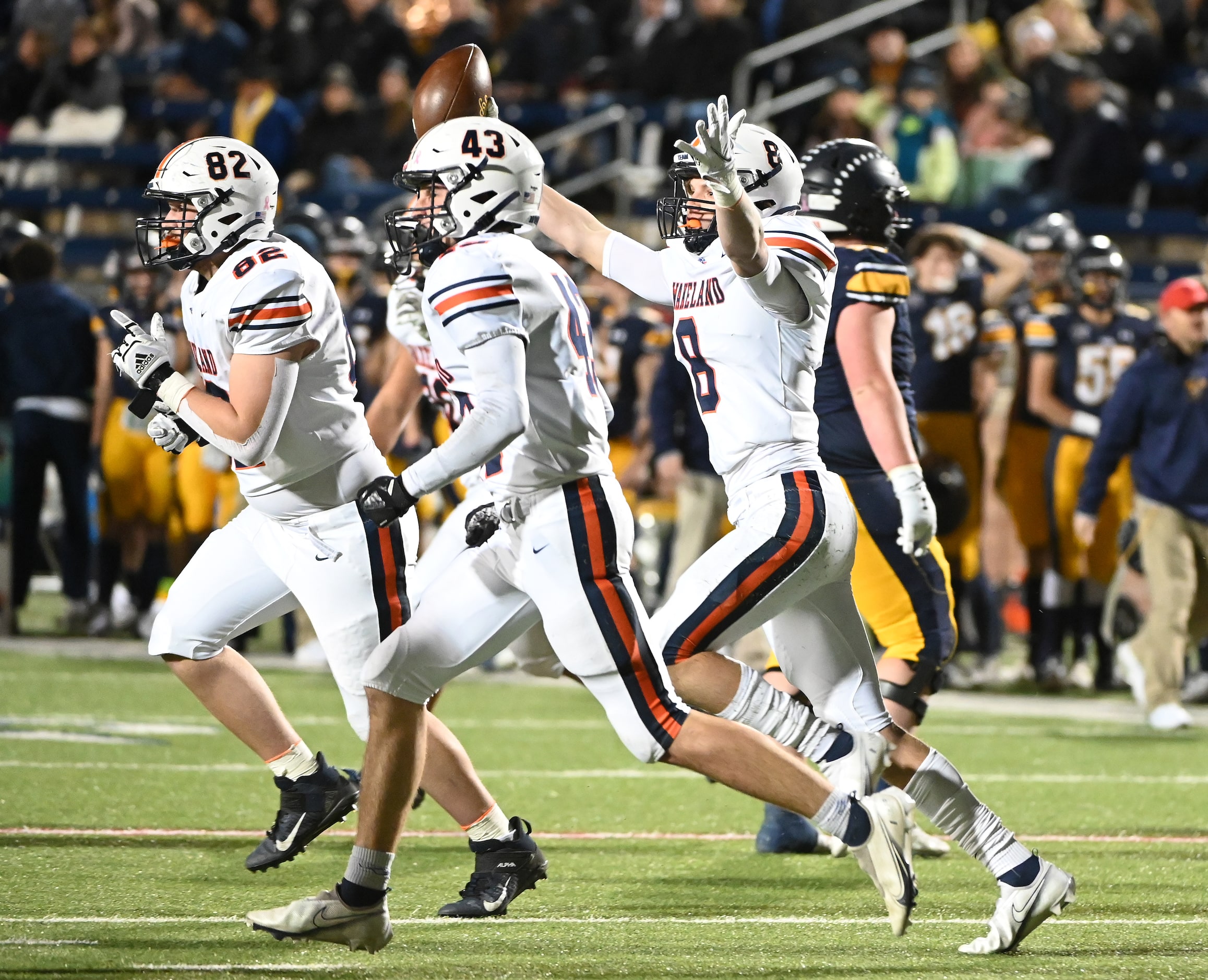 Wakeland's Henry Johnson (8) celebrates after his fumble recovering with Colin Peek (43) and...