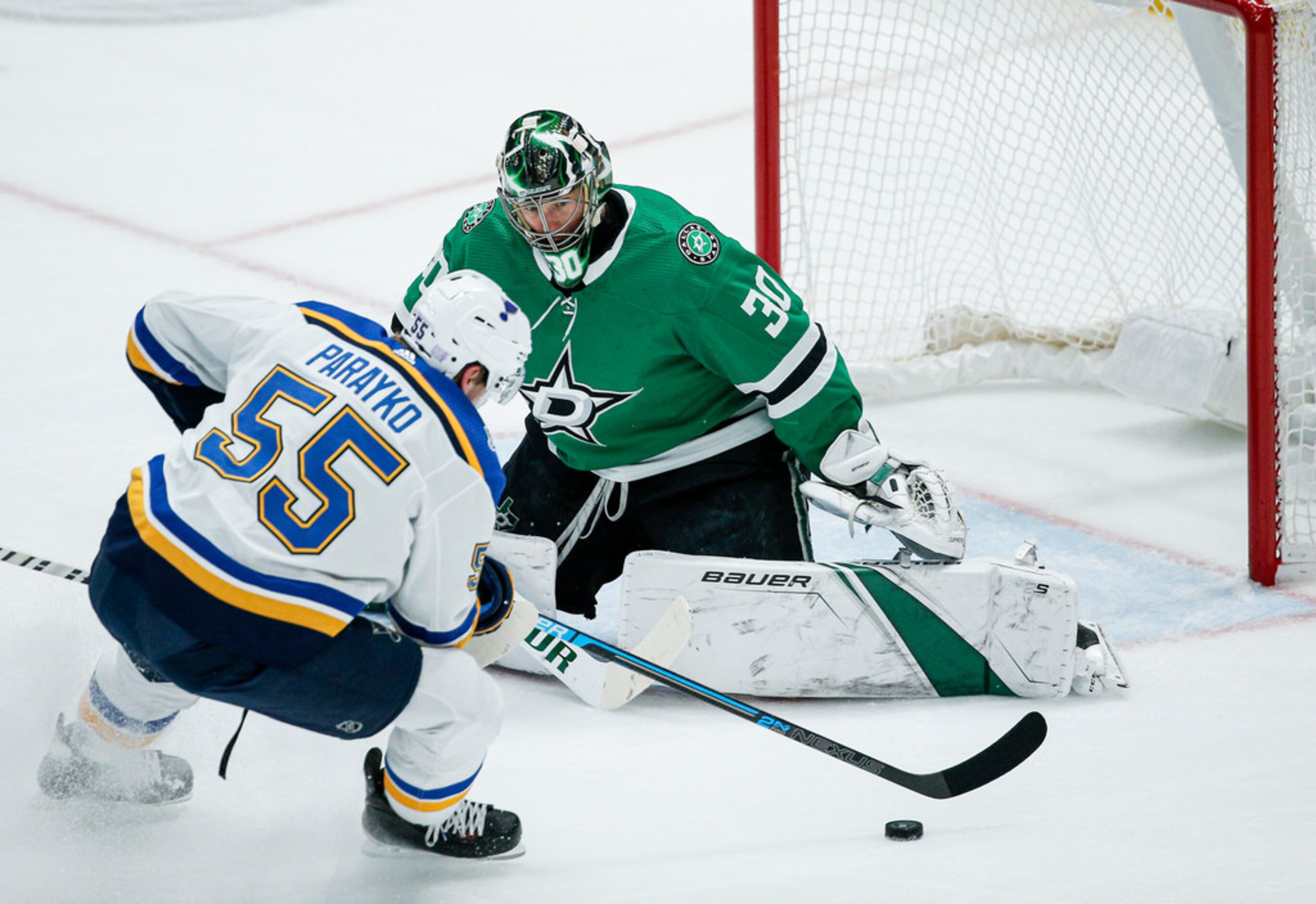 St. Louis Blues defenseman Colton Parayko (55) attempts a shot as Dallas Stars goaltender...