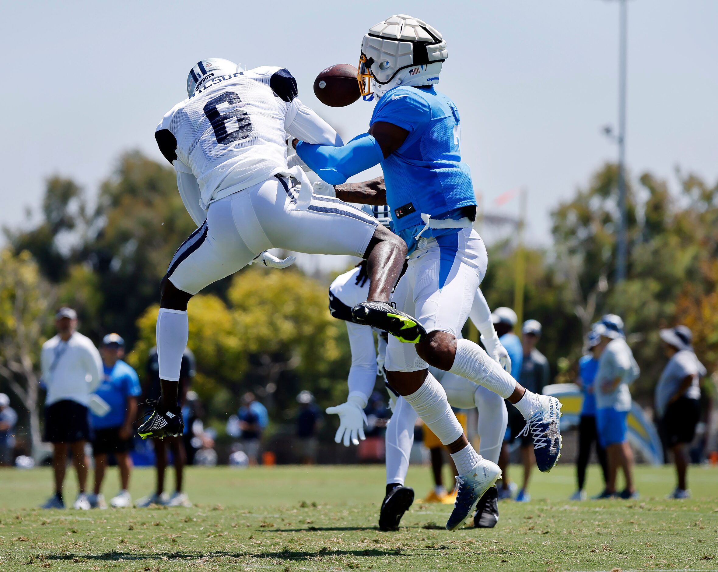 Dallas Cowboys safety Donovan Wilson (6) attempts to intercept a pass intended for Los...