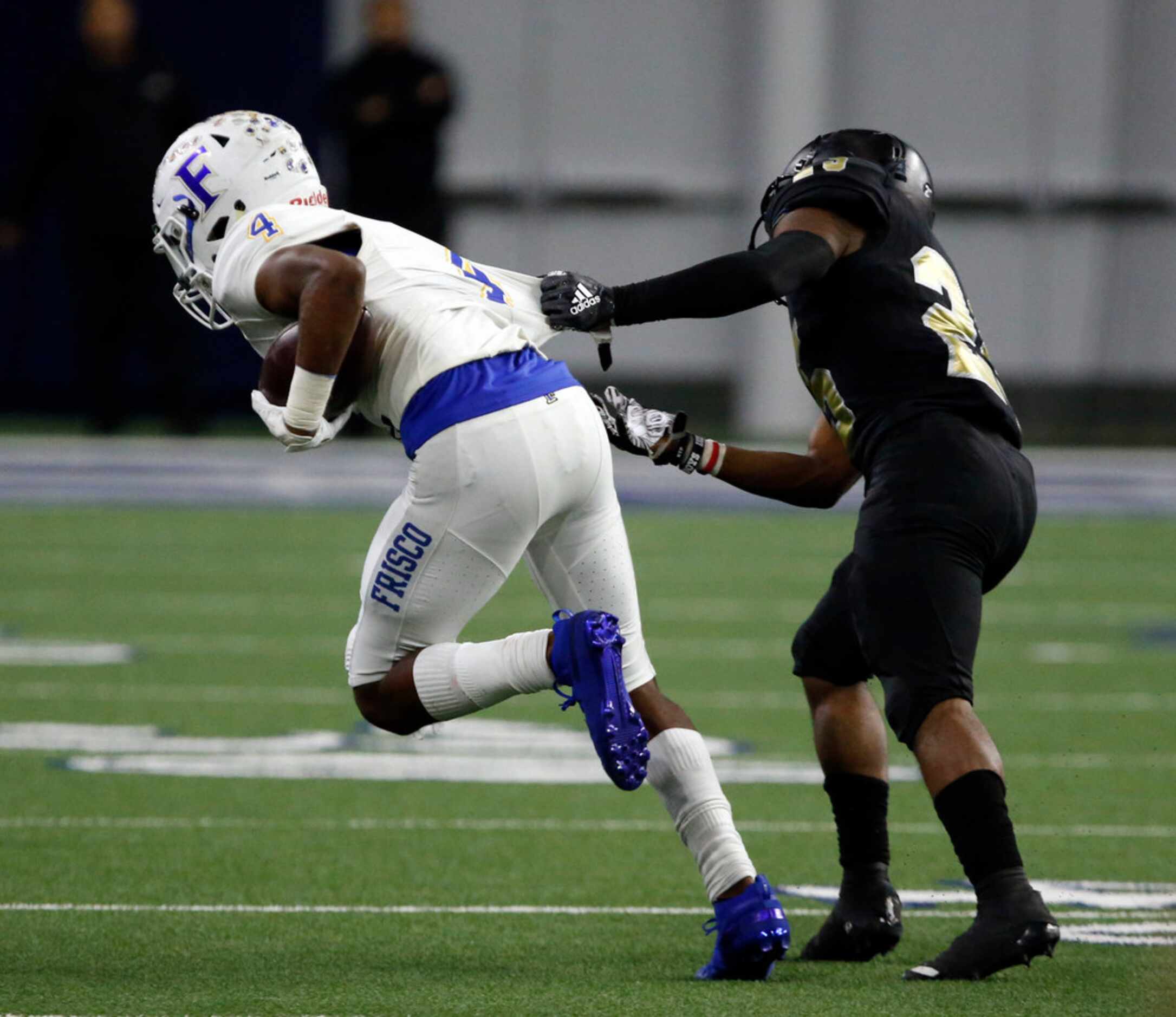 Frisco defender Chase Lowery (4) grabs an interception, as South Oak Cliff's Cameron Davis...