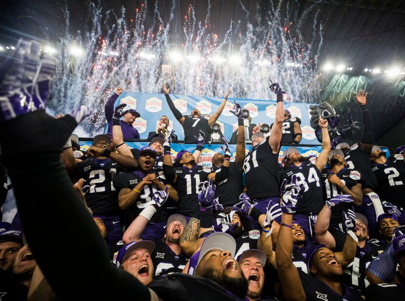 TCU Horned Frogs celebrate a 39-37 win over the Stanford Cardinals after the Valero Alamo...