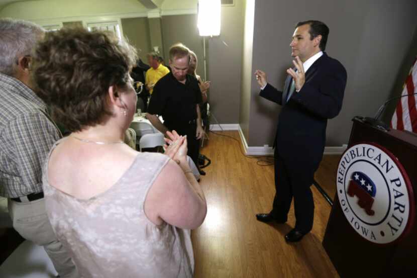Texas Sen. Ted Cruz, visiting with residents Friday during a fundraiser for the Iowa...
