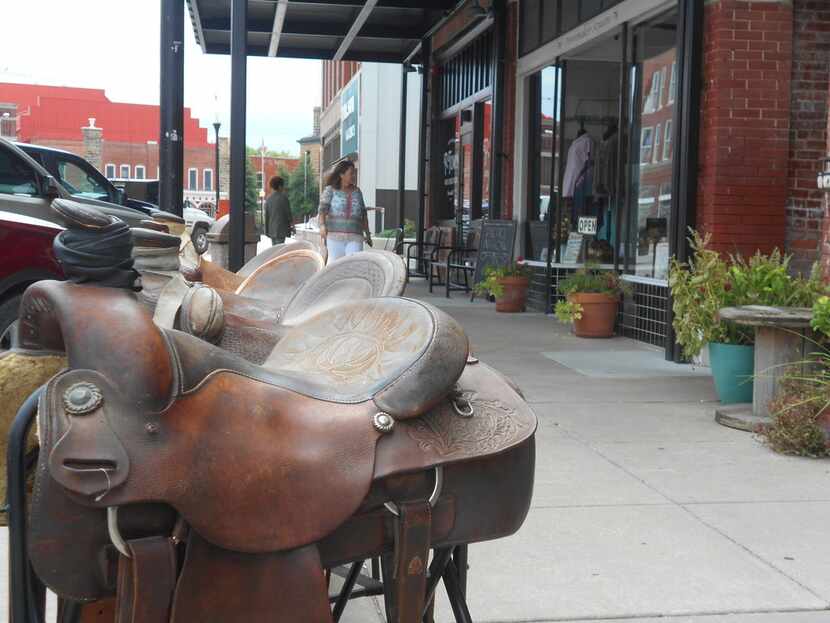 Downtown Pawhuska is a working cowboy town where saddles can be found for sale along the...