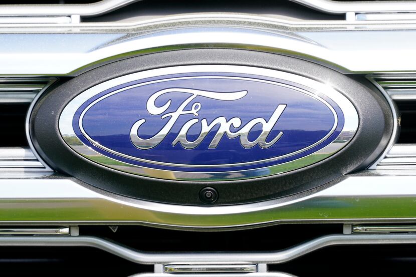 FILE - A logo on a vehicle at a Ford dealership in Springfield, Pa., Tuesday, April 26,...