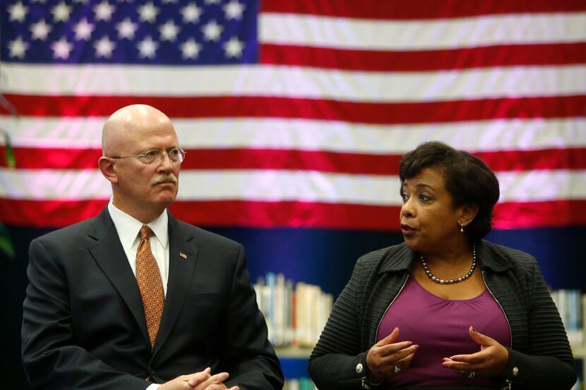 Attorney General Loretta Lynch and U.S. Attorney John Parker talk to students at Sunset High...