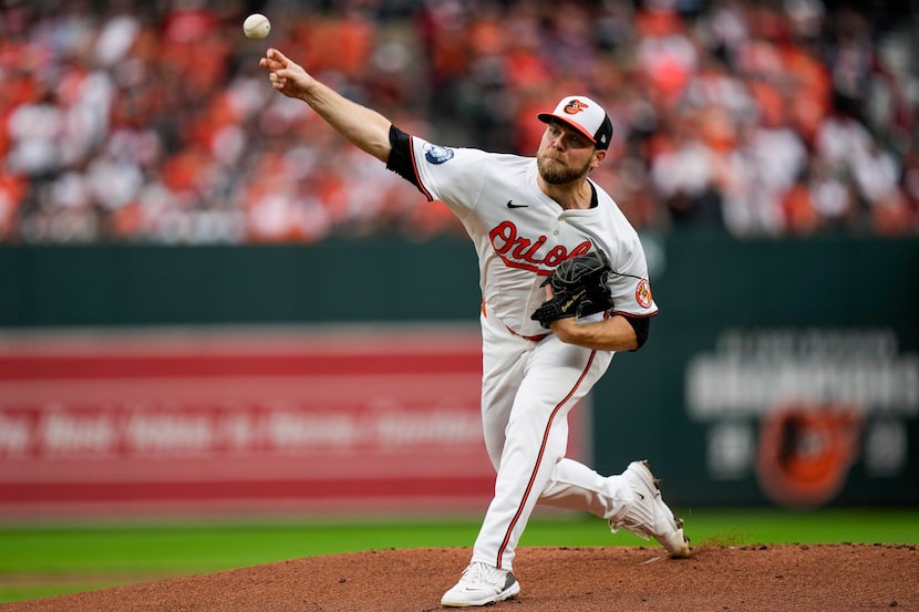 Baltimore Orioles starting pitcher Corbin Burnes delivers during the first inning of Game 1...