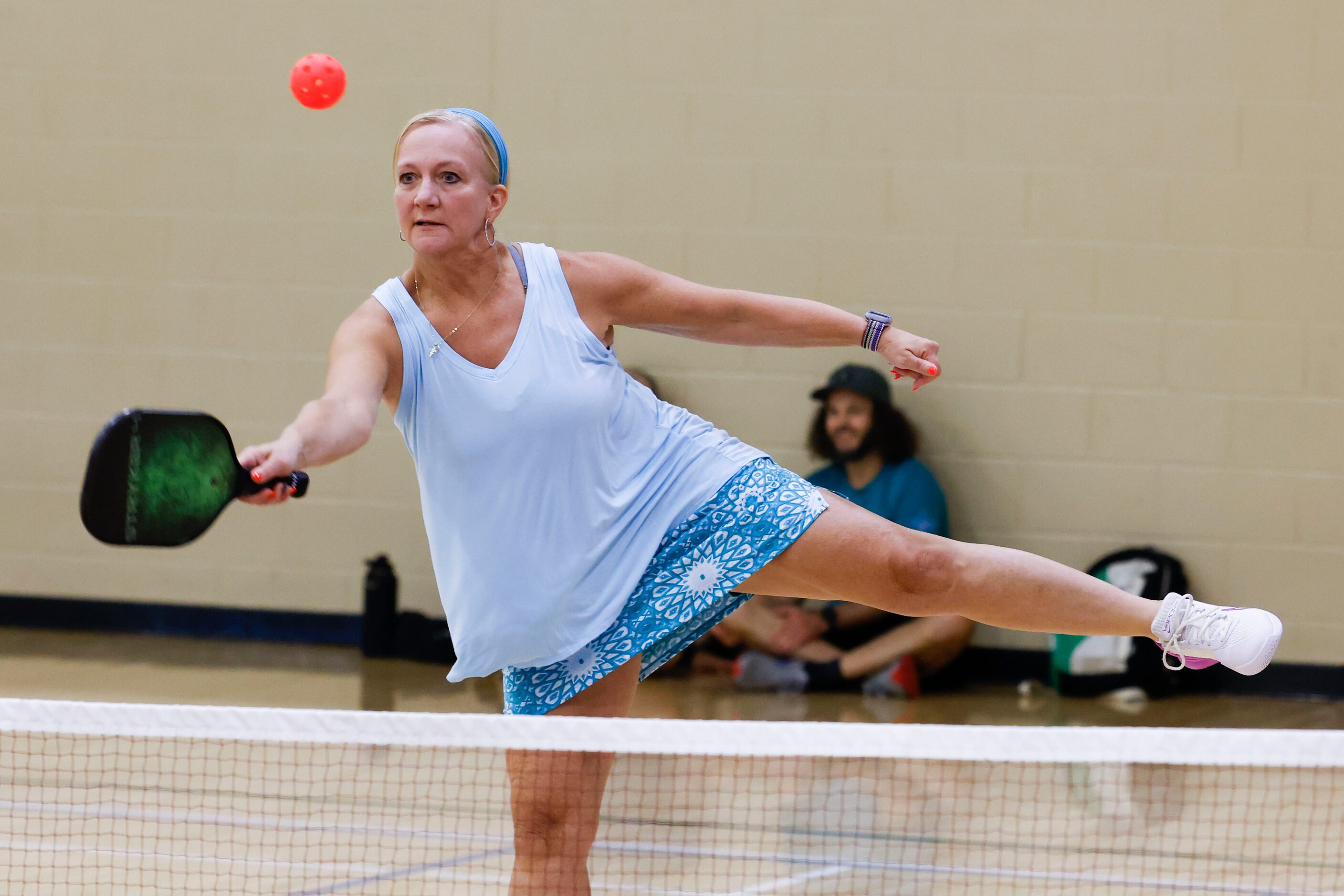 Holly Brown of Plano hits during her regular pickle ball game on Friday, May 26, 2023 at Tom...