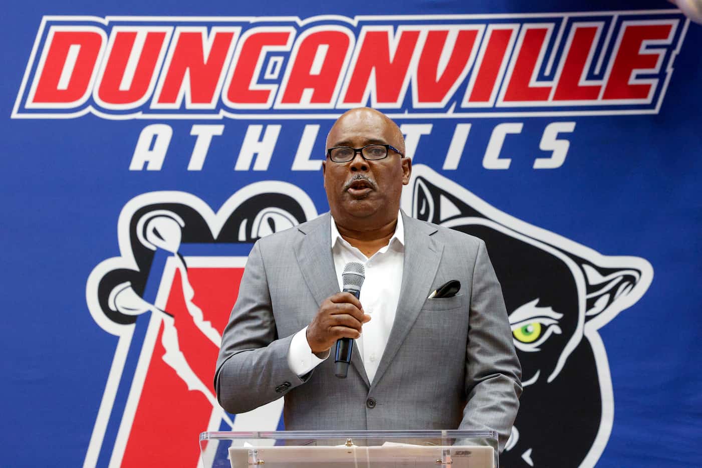 Duncanville head coach Reginald Samples speaks during a college commitment ceremony for...