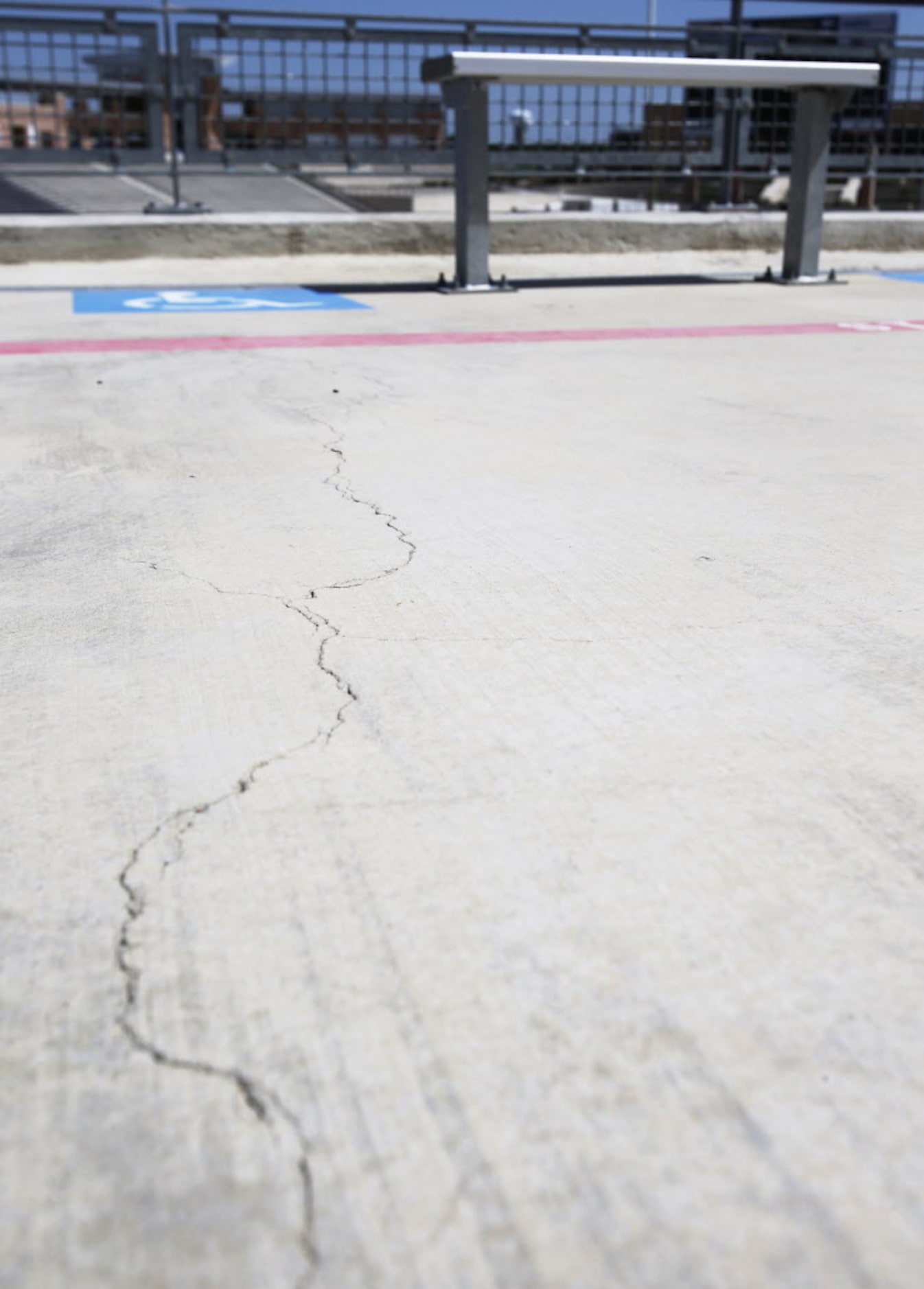 Some of the many cracks can be seen in this photo at Eagle Stadium in Allen, Texas on May...