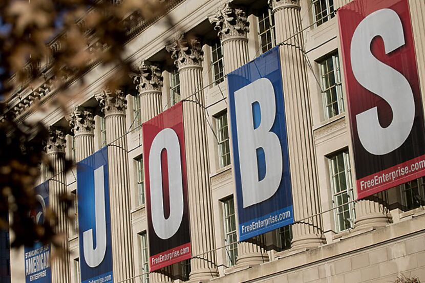 Banners spelling out "JOBS" hang outside the U.S. Chamber of Commerce in Washington, D.C....