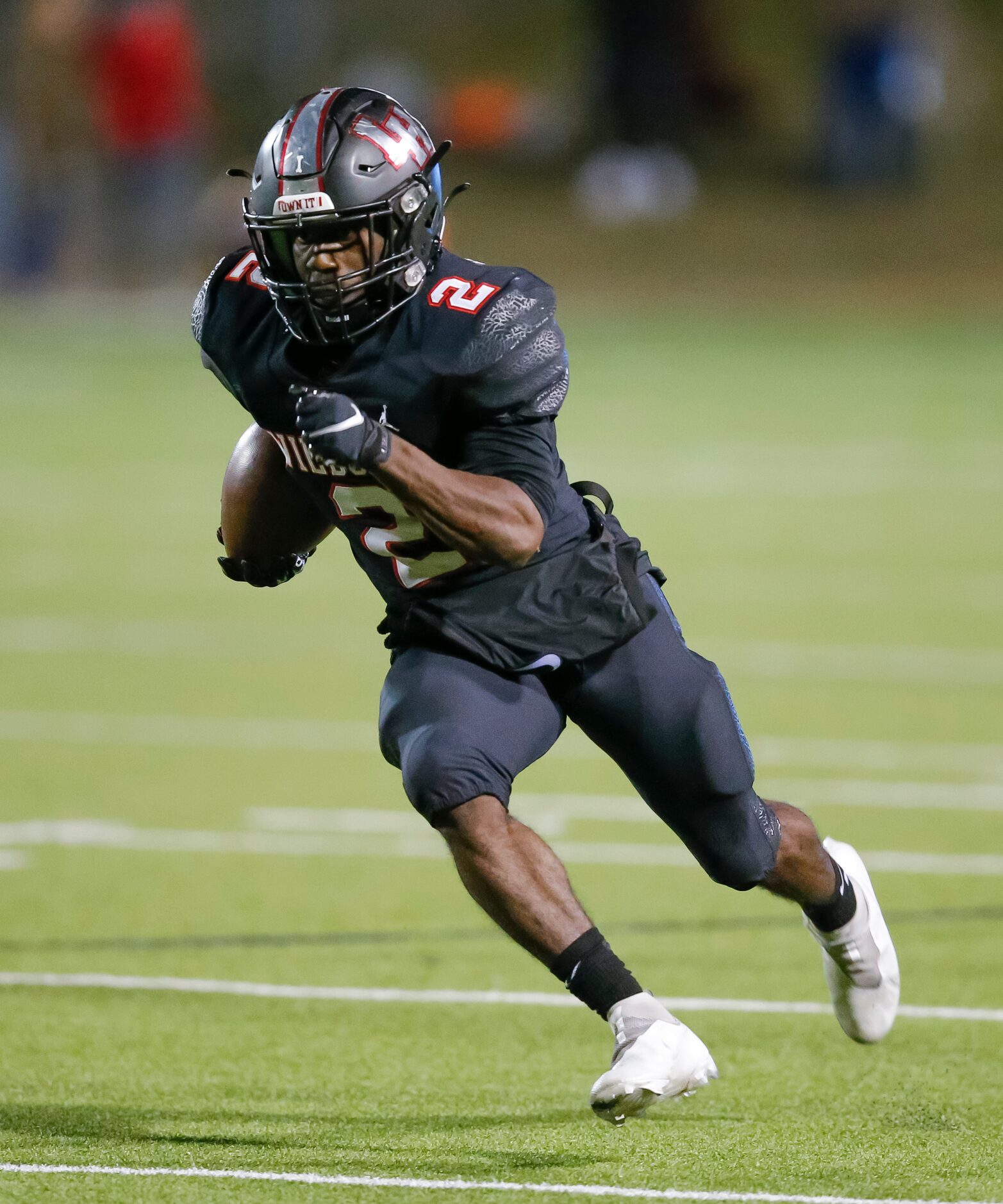 Lake Highlands senior running back Noelle Whitehead (2) carries the ball during the first...