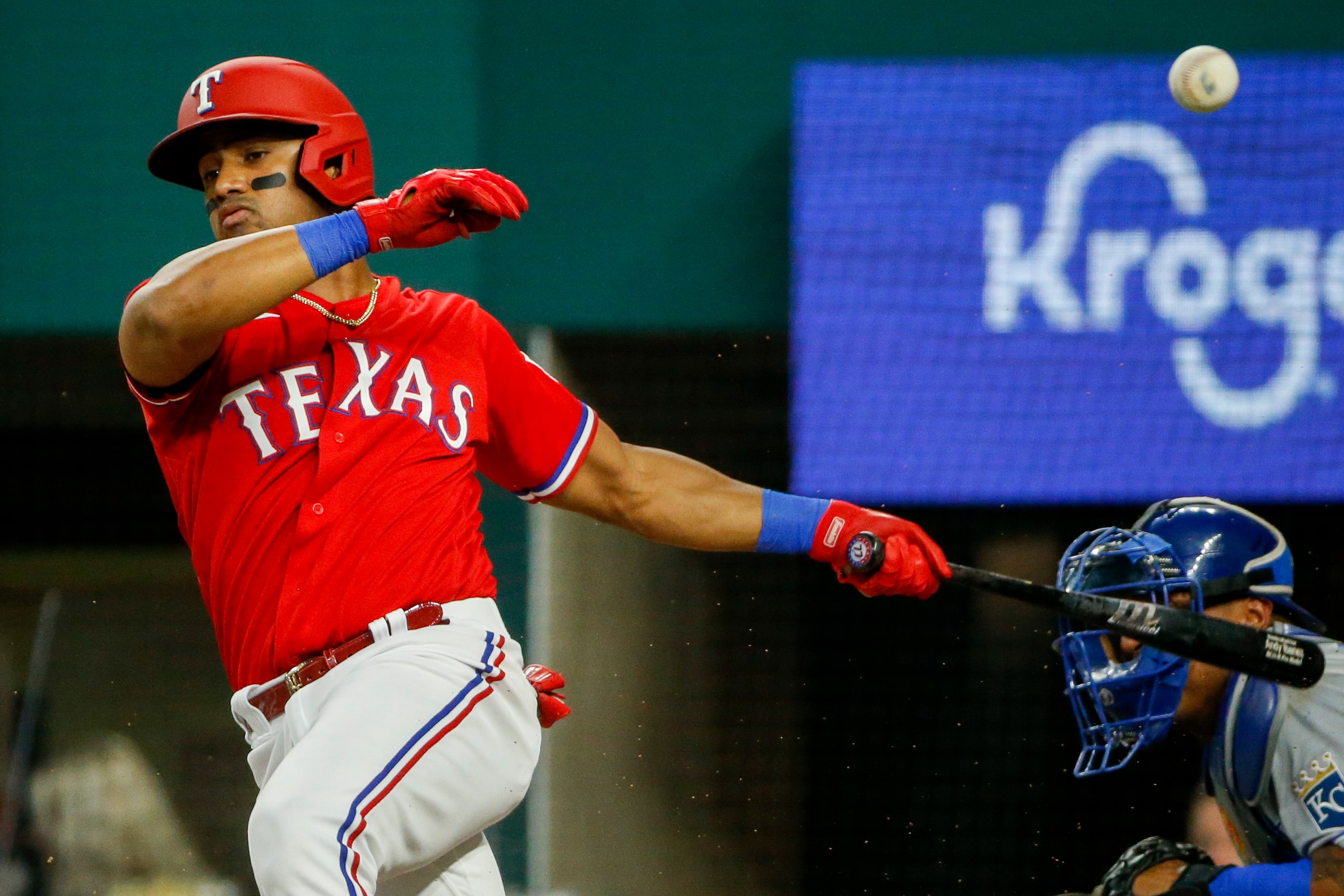 Texas Rangers first baseman Andy Ibanez (77) fouls off a pitch during the second inning...