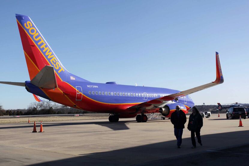 FILE - In this Jan. 13, 2014 file photo, Southwest Airlines Flight 4013 sits at the M....