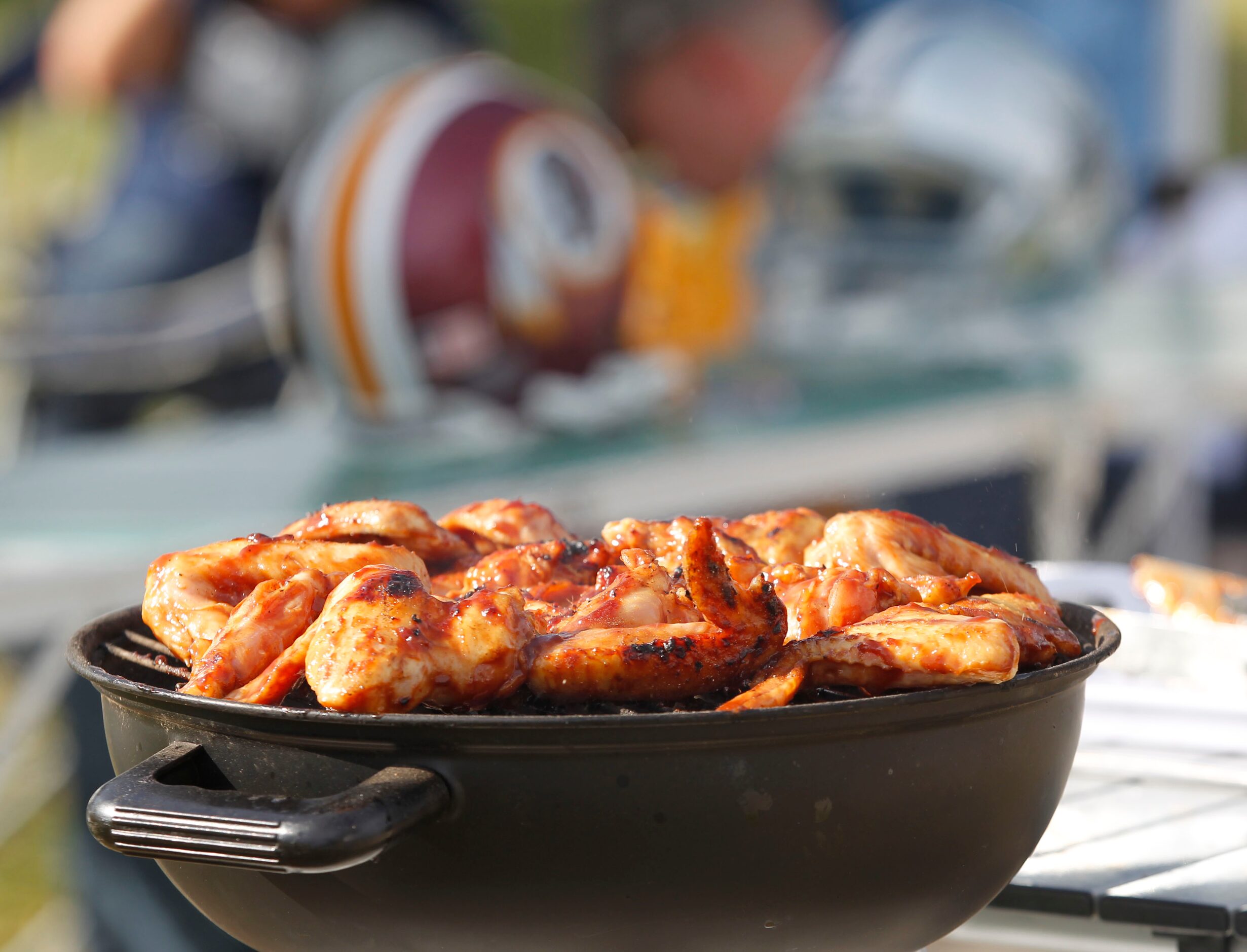 Chicken wings on the grill prior to the Dallas Cowboys-Washington Redskins NFL game at AT&T...