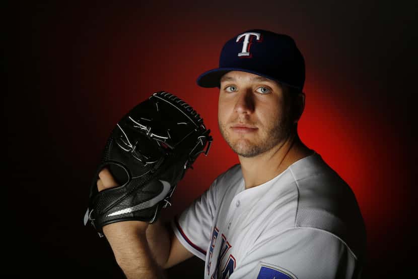 Texas Rangers pitcher Shawn Tolleson stands for a portrait during the Rangers media day in...