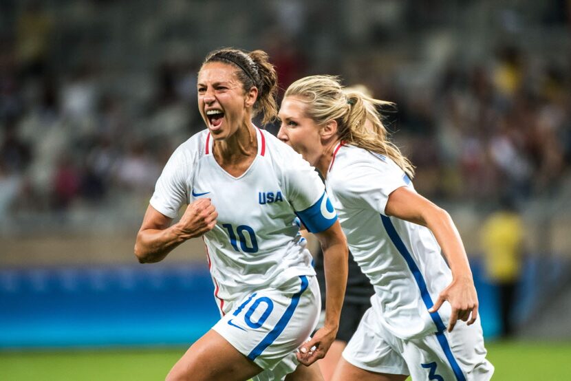 Carli Lloyd (L) of the USA celebrates her goal during a Rio 2016 Olympic Games first round...