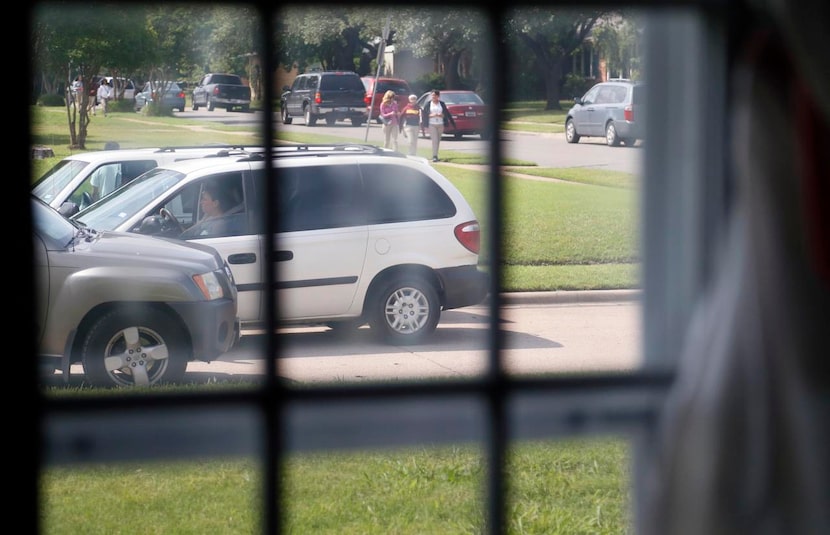 
Students walk home from Gaston Middle School on Mariposa Drive in the Alger Park-Ash Creek...