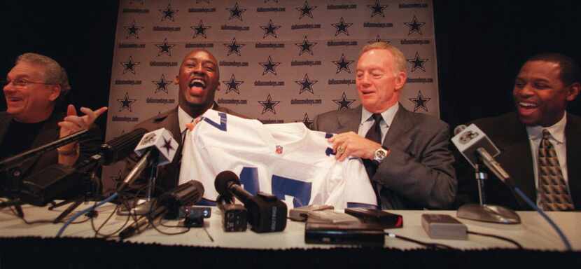 Dallas Cowboys coach Dave Campo (from left), Quincy Carter, quarterback from the University...