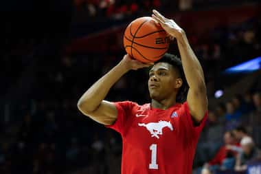 SMU guard Zhuric Phelps (1) attempts a three-point shot during the second half of an NCAA...