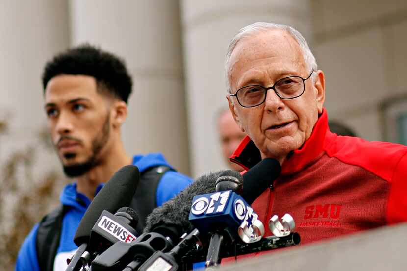 Larry Brown (right), head coach of the Southern Methodist University men's basketball team,...