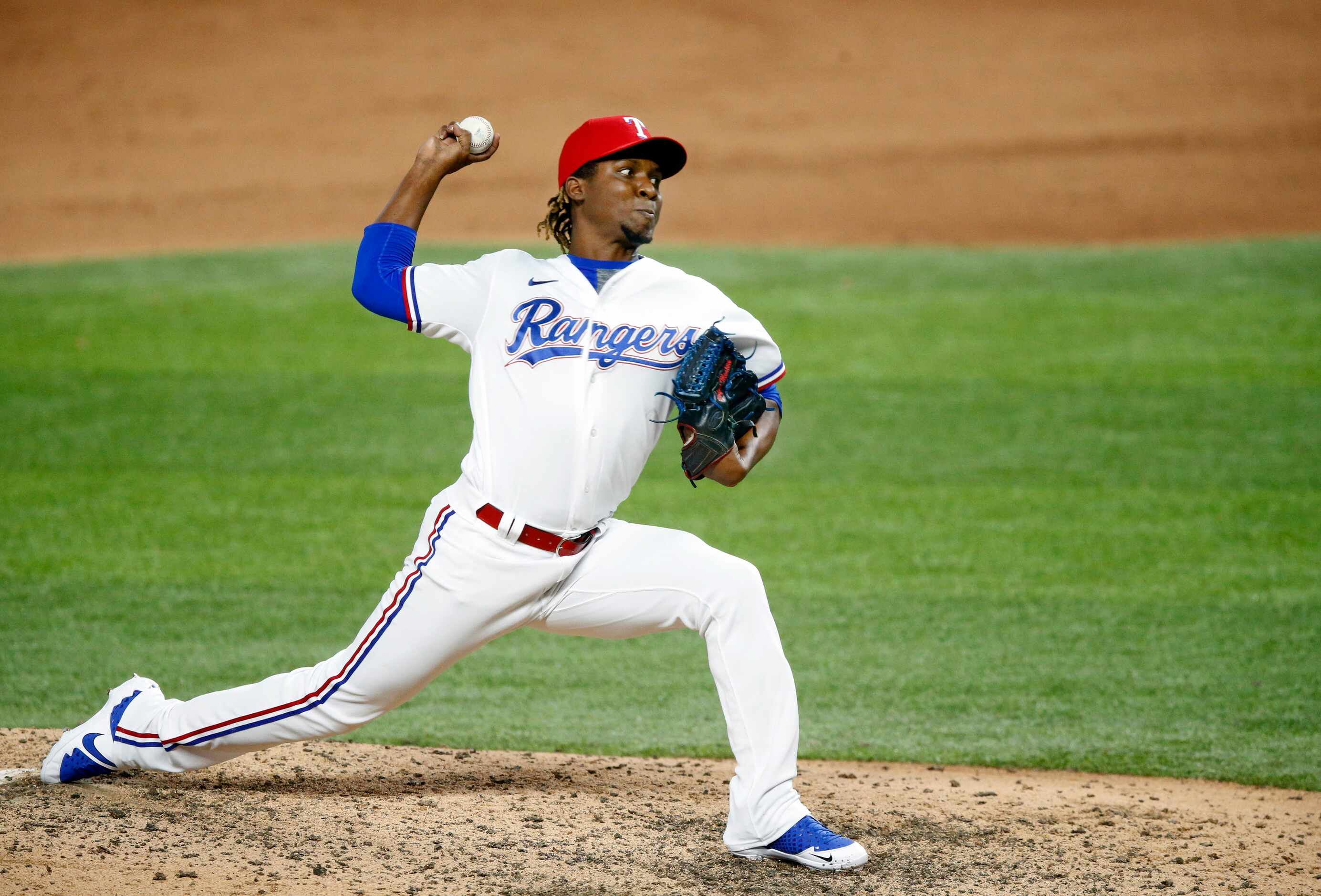 Texas Rangers relief pitcher Rafael Montero (48) throws in the ninth inning against the...